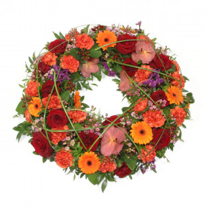 Rundpyntet krans i varme farver